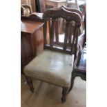 A pair of oak Gothic style chairs