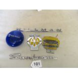 A Vickers Armstrong car club badge, blue glass Rolls Royce paperweight, AA badge and chromed metal