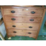 A satin pine chest of four drawers