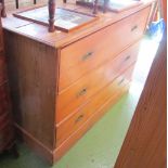 A pine chest of three drawers