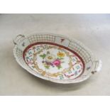 A Porcelaine Royale pierced edge dish decorated flowers