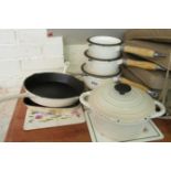 Various cream enamel cooking pans