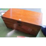 A camphorwood chest with brass corners and handles