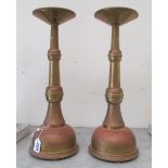 A pair of ecclesiastical candelsticks