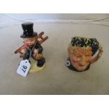 A Goebbel chimney sweep and a Royal Doulton Bacchus character jug