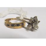 A flowerhead diamond ring and another