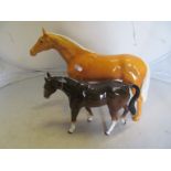 A large Beswick horse (slight chip) and a smaller horse (ear chipped)