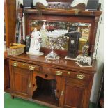 A mahogany mirror back sideboard