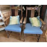 A pair of oak carver chairs