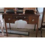 A 19th Century mahogany side table with three drawers and later attached mirror