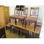 A set of six Edwardian walnut dining chairs