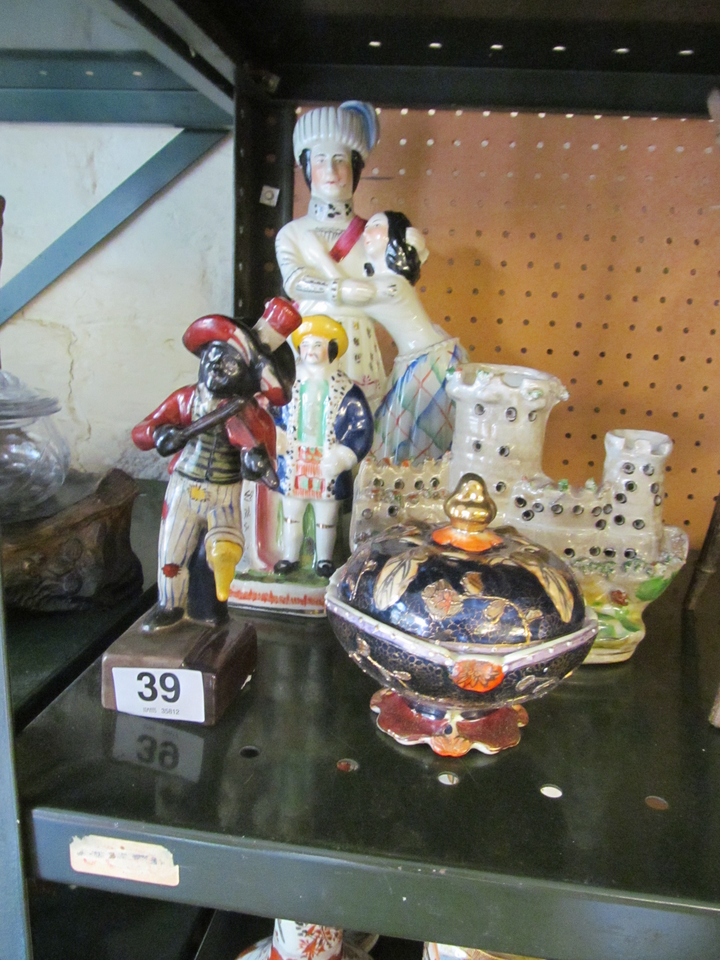 Four modern Staffordshire figures and a pot