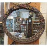 A barbola framed oval mirror