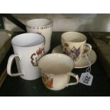 An Edward VIII coronation mug, two other mugs and a cup and saucer
