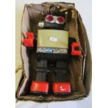 A Saturn battery operated 13" giant walking robot