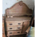 A pine chiffonier with gallery, three drawers and cupboard