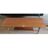 A teak two tier coffee table