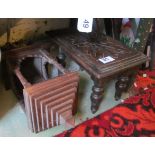 A small oak stool and a wall hanging candle holder