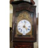 A French longcase clock the enamel dial with blue numerals and a brass cresting of 18th Century