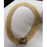 A cultured pearl collar necklace with flower head diamond clasp