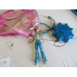 A Barbie in rucksac with music player