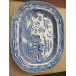 A Victorian blue and white willow pattern meat plate
