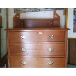 A satin pine three drawer dressing table