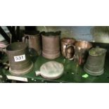Two pewter tankards, two plated mugs, hip flask and two pewter jugs .