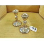 A pair of silver (Birmingham 1931) Broadway & Co candlesticks