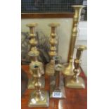 Three pairs of 19th Century brass candlesticks and two others