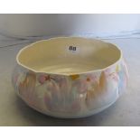 A Royal Staffordshire Clarice Cliff bowl decorated pastel leaves and fruit