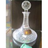 A ships decanter with silver label