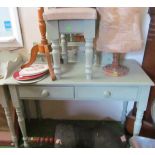 A green painted dressing table and stool