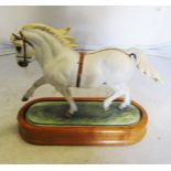 A Royal Worcester bisque Welsh mountain pony, Coed Coch Planed, owned by Lord Kenyon by Doris