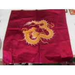 A Chinese wool fragment and an embroidered panel dragon design