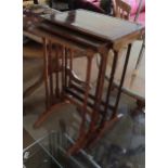 A nest of three mahogany tables (one foot a/f)