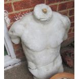 A cast male torso
