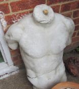 A cast male torso