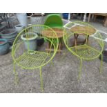 Two green garden chairs