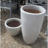 A tall white garden pot and a small pot