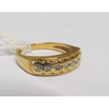 An 18k gold and diamond ring