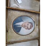 A miniature portrait of young man signed (i.c)