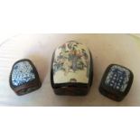 Three Chinese lacquer boxes with porcelain lids