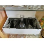 A Royal Doulton glass decanter and four glasses boxed