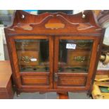 An Edwardian oak smokers cabinet