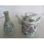 A Chinese famille rose teapot, small vase and a blanc de chine figure group