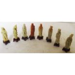 Eight small soapstone figures, another larger figure and three other pieces