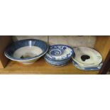 A bowl and blue and white items