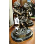 A bronze figure group two cherubs wrestling, inscribed Geria Vichi on marble base