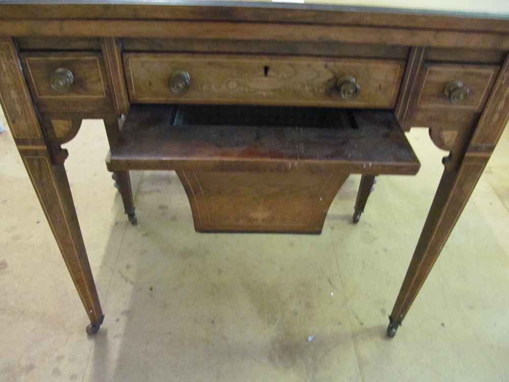 A late Victorian rosewood games/work table with a foldover top revealing backgammon, chess and - Image 4 of 5